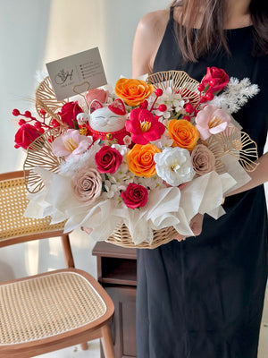 Colorful soap flower basket with lucky cat ornament and festive elements, designed for business grand opening celebrations.