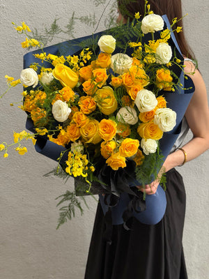 A bouquet of yellow rose spray mixed with yellow rose ideal for birthday celebration or anniversaries at Kuala Lumpur prepared by Hug and Heart Florist.