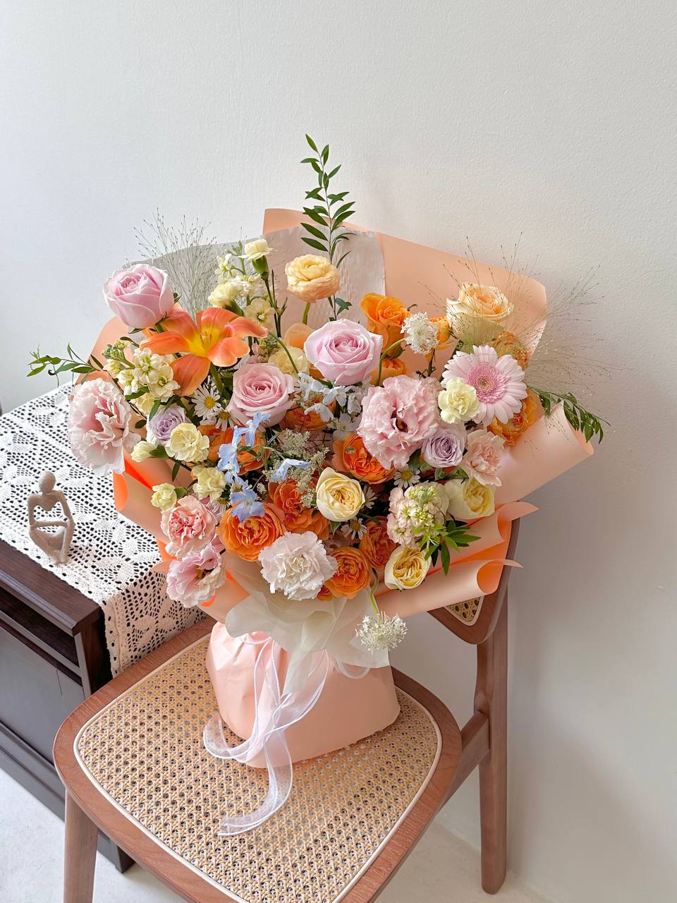 Fresh peach, yellow, and pink flower bouquet for birthday celebration in Malaysia