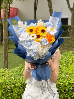 Elegant sunflower and rose soap flower bouquet for graduation ceremony, same-day flower delivery service across Kuala Lumpur and Selangor universities.