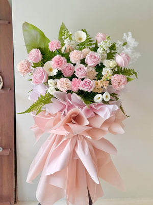 A grand opening flower stand with pastel pink colour theme, prepared by Hug and Heart Florist at Sunway Geo Avenue.