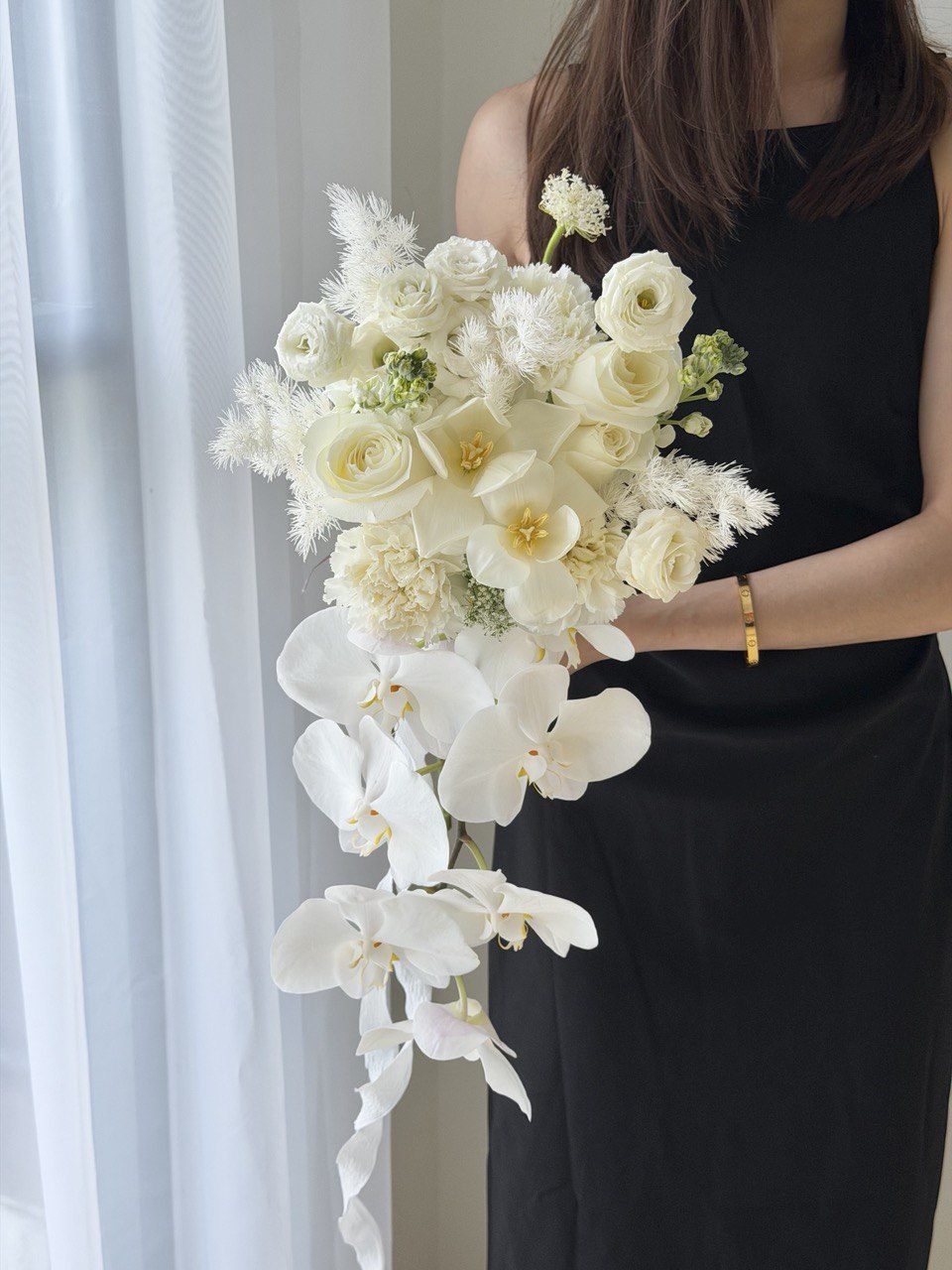 Minimalist white orchid cascade bridal bouquet for ROM ceremony by Hug and Heart Florist Subang Jaya Kuala Lumpur Malaysia.
