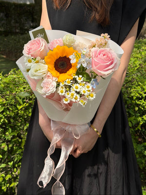 Fresh sunflower bouquet with pink roses, white eustoma, chamomile daisies and blue delphinium, perfect for birthday, graduation and congratulations gifts with same day flower delivery Kuala Lumpur and Selangor.
