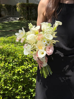Luxury white and blush pink bridal bouquet featuring calla lilies, tulips, white roses, pink roses and astilbe, perfect for wedding and ROM ceremony in KL and Selangor.