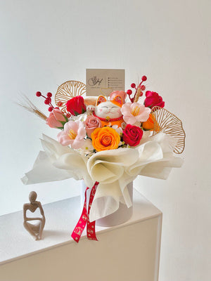 Elegant flower bouquet with a lucky cat centerpiece, ideal for business celebrations or store openings. The arrangement is wrapped in white box with a red ribbon.
