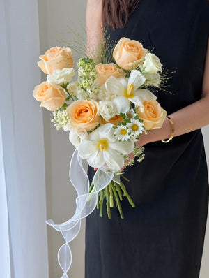 Champagne rose bridal bouquet with white blooms, elegant hand-tied design perfect for ROM and wedding in Kuala Lumpur and Selangor.