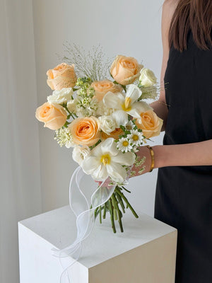 Elegant bridal bouquet featuring champagne roses and white flowers, perfect for intimate wedding and ROM in Kuala Lumpur.