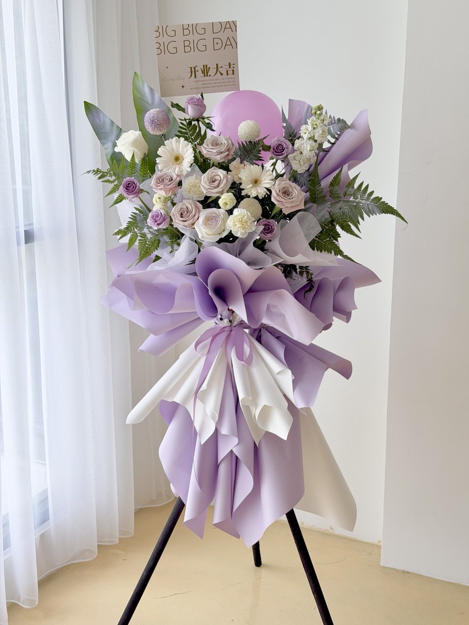 Luxury purple and white congratulatory flower stand for grand opening, fresh roses and greenery, same day delivery in KL and Selangor.