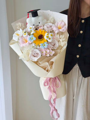 Graduation soap flower bouquet with sunflower and pastel roses perfect for graduation gift in Kuala Lumpur.