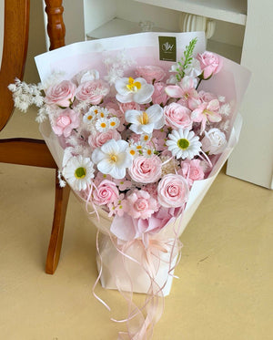 A large bouquet of Valentine flower featuring pink rose, kiss of fairy soap flower and fillers.