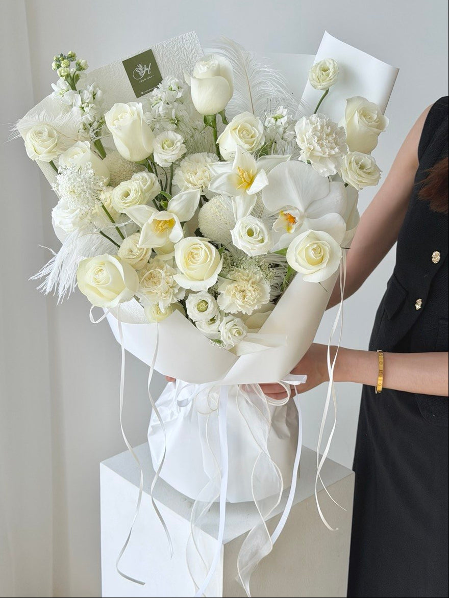 White theme bouquet with white roses, tulips and phalaenopsis orchid, premium romantic flower for wife and girlfriend in Kuala Lumpur same day delivery.