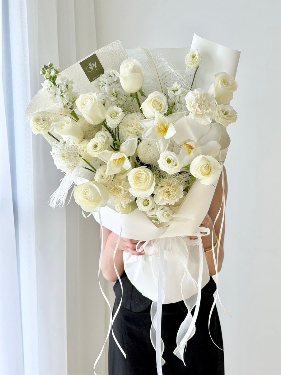 Elegant white bouquet with roses, tulip and orchid phalaenopsis, luxury flower arrangement for girlfriend in Selangor with same day delivery.