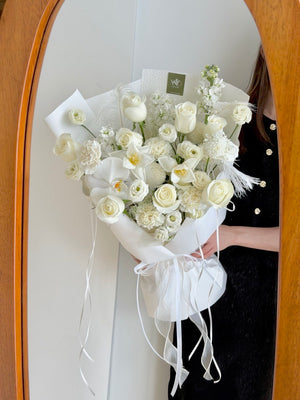 Minimalist premium white bouquet with phalaenopsis orchid and white roses, elegant flower arrangement for wife in Selangor same day delivery.