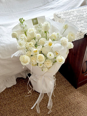 Premium white flower bouquet with white roses, tulips and fillers, minimalist romantic gift for wife in Kuala Lumpur and Selangor.