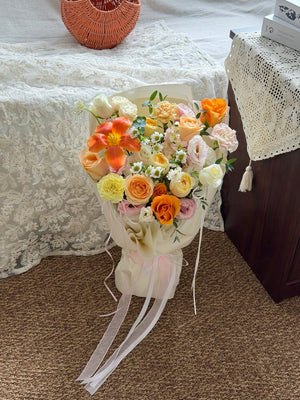 Handcrafted orange tulip bouquet with fresh garden flowers by Hug and Heart Florist Sunway Geo, available for same day flower delivery.