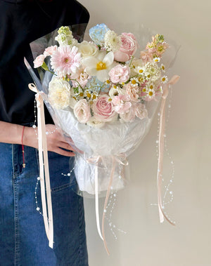 Handmade pastel bouquet with white tulip, roses, carnations, and chamomile flowers for a dreamy, romantic gift.