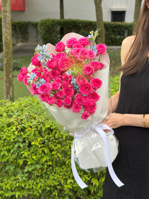 Romantic sophie rose spray bouquet with clustered pink roses in white wrapping, perfect for birthday and celebration flower delivery in KL Malaysia.