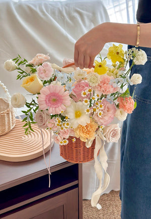 Charming mix of fresh flowers in a rustic basket — suitable for birthdays, congratulations, or just because.