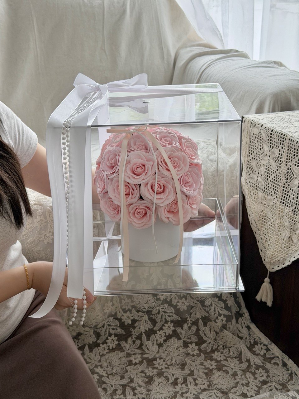 Luxury soap flower bouquet in a transparent acrylic box featuring pastel pink roses, ideal birthday gift and special occasion present.