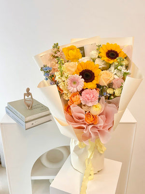 1. A woman holds a vibrant bouquet of sunflowers, symbolizing graduation and well wishes, outside a shop in Sunway Subang Jaya.
2. A woman proudly displays a bouquet of sunflowers, perfect for graduation and get well soon occasions, near a shop in Sunway Subang Jaya.
3. A woman with a cheerful bouquet of sunflowers, ideal for graduation celebrations and get well soon messages, outside a shop in Sunway Subang Jaya.