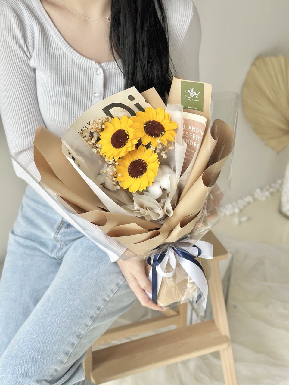 A soap flower sunflower bouquet perfect for graduation at Kuala Lumpur prepared by Hug and Heart Florist Subang Jaya.