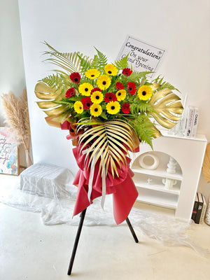 A grand opening flower stand is place in a office in Kuala Lumpur.