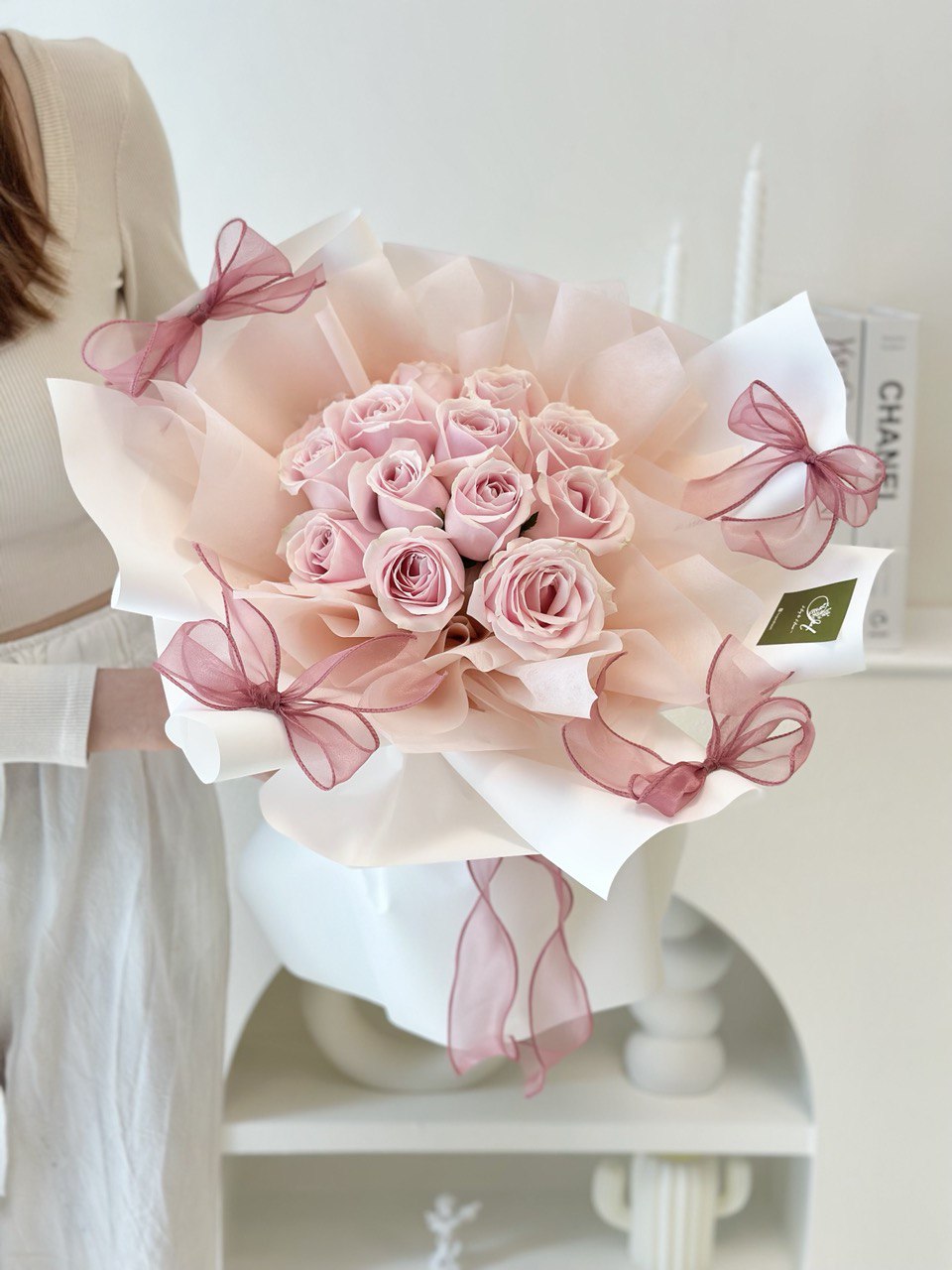 A bouquet of pink rose with pink ribbon perfect for birthday, anniversaries, just because or apology flower