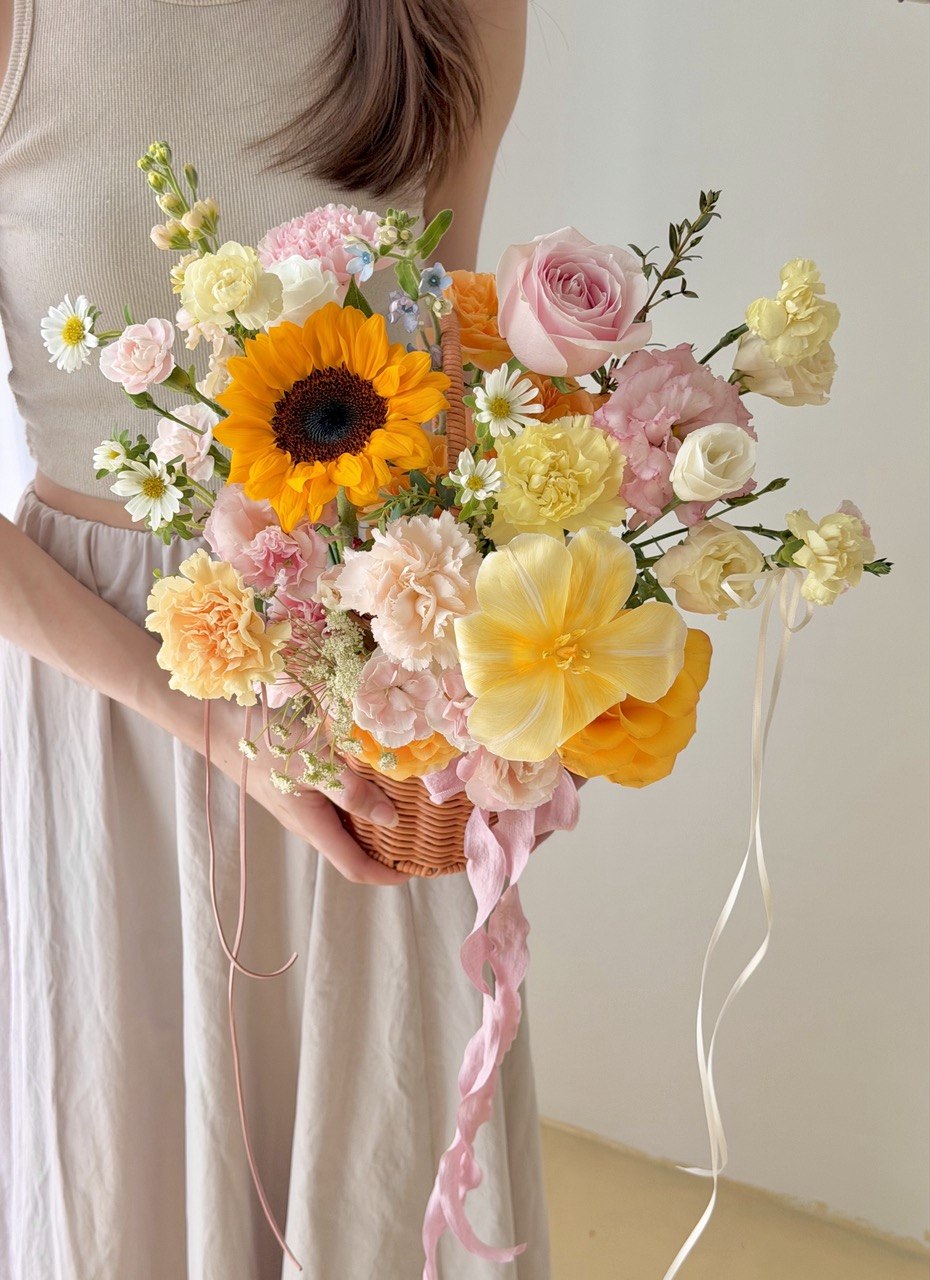 Elegant sunflower flower basket mixed with yellow tulips and pastel flowers, last minute flower delivery Bukit Jalil and KL.
