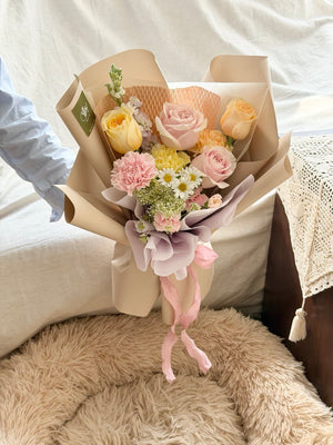 A small bouquet of pastel theme flower perfect for small flower surprise at Kuala Lumpur.