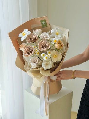 Elegant nude beige soap flower bouquet with premium roses and daisy flowers, perfect long lasting gift for birthdays and anniversaries.