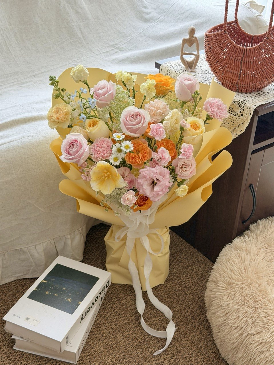 Elegant yellow wrapping flower bouquet with pastel mixed roses and soft pink flowers, suitable for birthday and anniversary gifts - same day flower delivery Kuala Lumpur and Selangor.