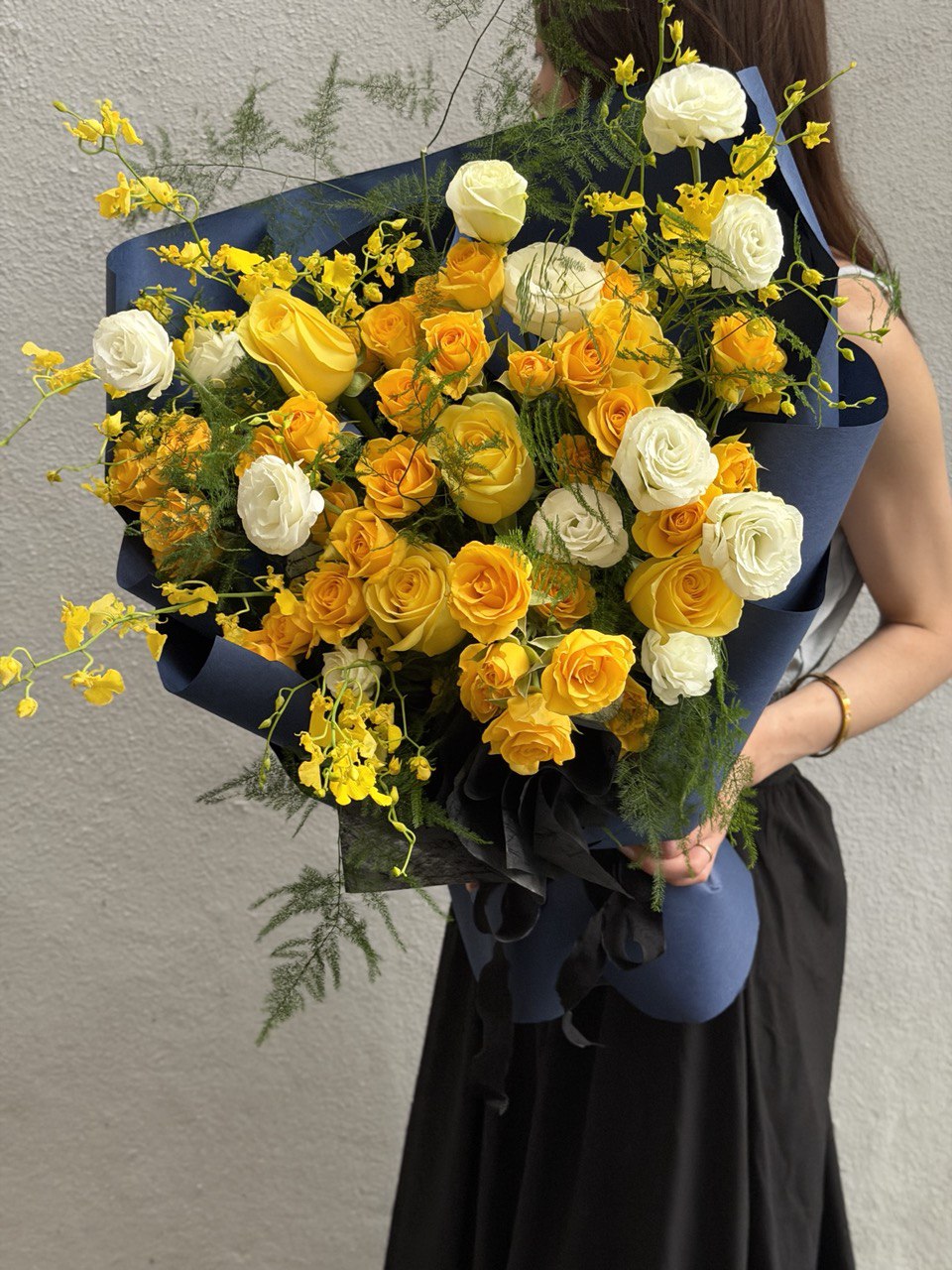 A bouquet of yellow rose spray mixed with yellow rose ideal for birthday celebration or anniversaries at Kuala Lumpur prepared by Hug and Heart Florist.
