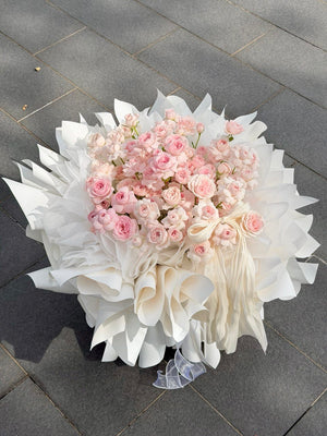 Elegant Kiss of Fairy rose spray bouquet wrapped in luxurious ballet style paper, ideal for gifting with same day flower delivery in Kuala Lumpur and Selangor.