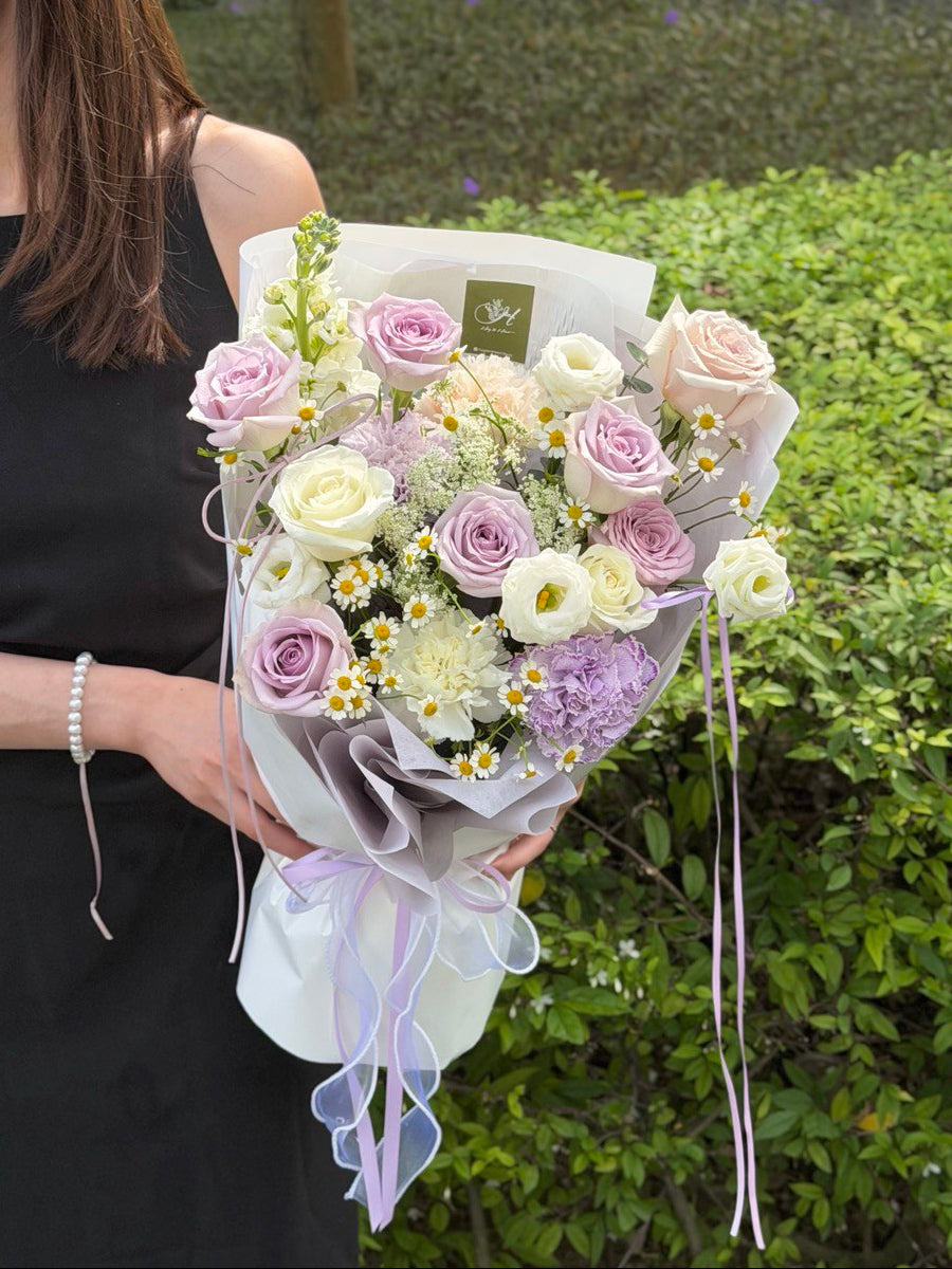 Pastel lilac and white rose bouquet with chamomile and carnation, premium florist Kuala Lumpur for birthday surprise.