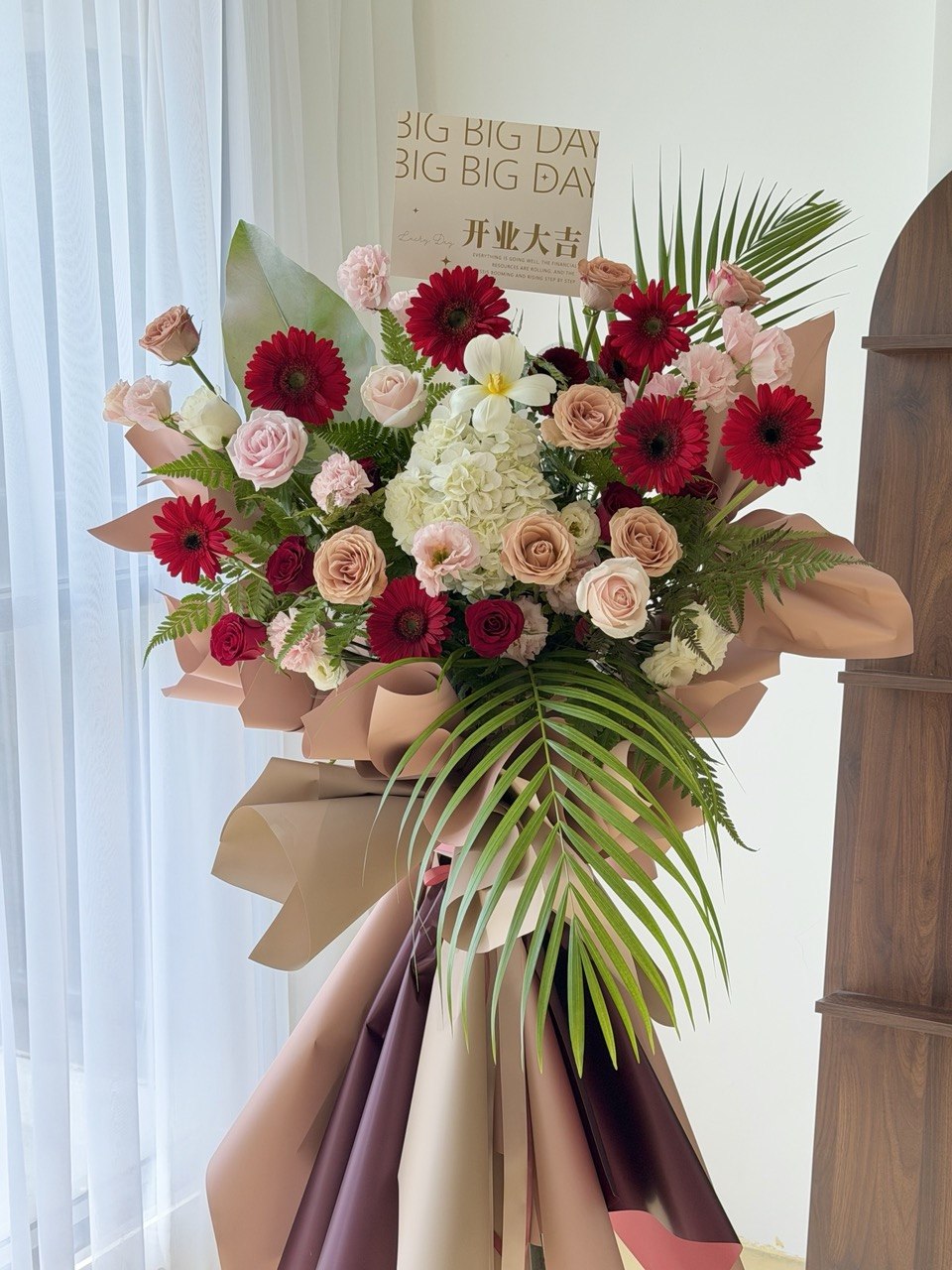 Luxury grand opening flower stand with red gerbera daisies, blush roses and elegant hydrangea arrangement. Perfect congratulatory flower stand for shop openings, office launches and business celebrations in KL and Selangor.