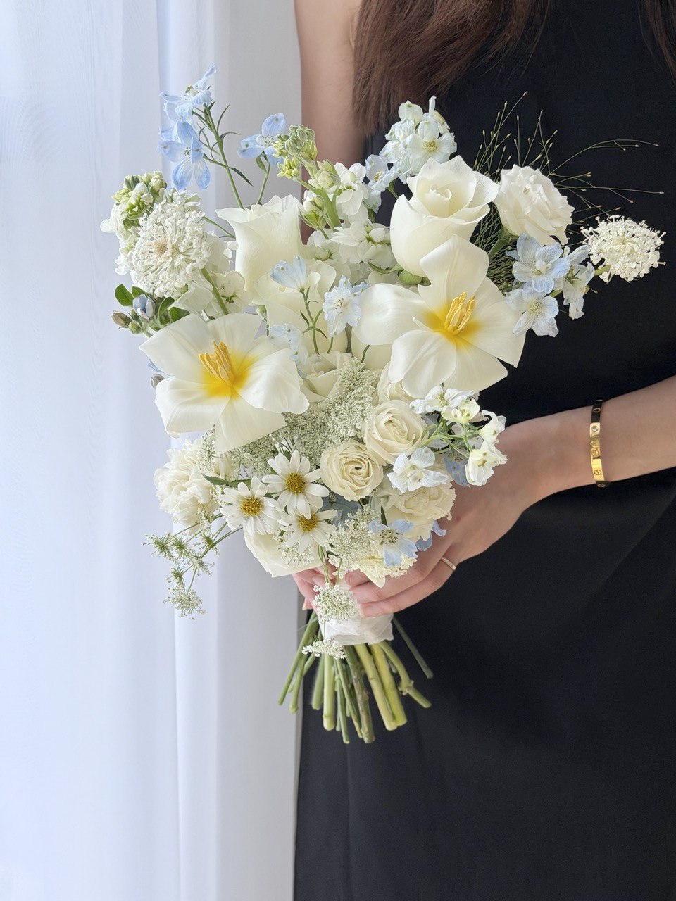 Elegant white tulip and blue delphinium wedding bouquet with white roses and blue oxypetalum, perfect for ROM ceremony and bridal bouquet, same day flower delivery in Kuala Lumpur and Selangor.
