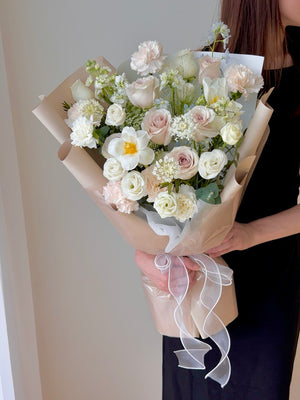Luxury white and blush pink flower bouquet with Quicksand roses and white tulips, ideal for saying sorry, expressing love, and celebrating special occasions in Kuala Lumpur.