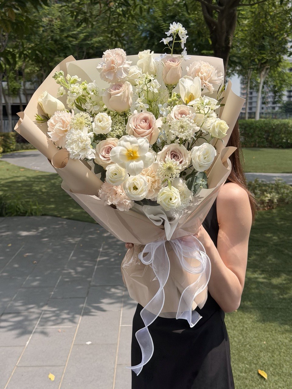 Elegant pastel bouquet with Quicksand roses, white tulips, carnations, and premium white blooms for birthdays, anniversaries, and apology flower delivery in KL and Selangor.