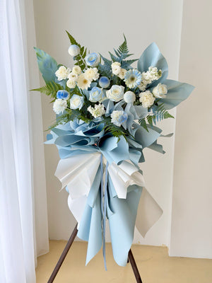 Modern blue wrapping grand opening flower stand with fresh flowers for same day delivery in KL and Selangor.