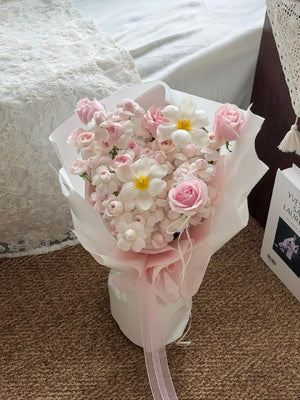Kiss of Fairy flower bouquet with pink roses and soft blooms for birthday.