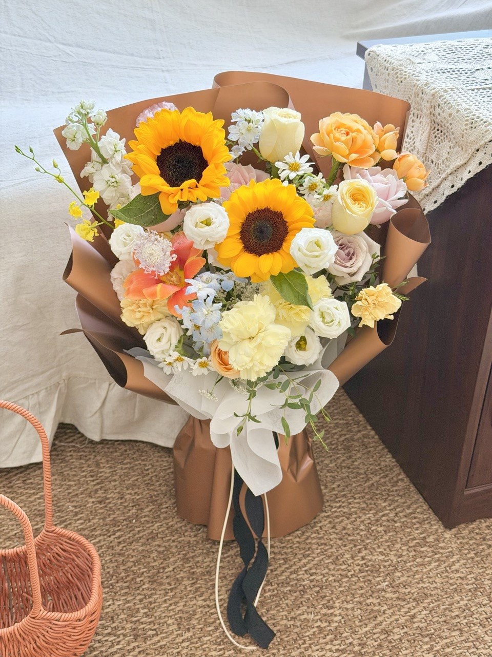 A bouquet of flower mixed with sunflower prepare by Hug and Heart Subang Jaya.