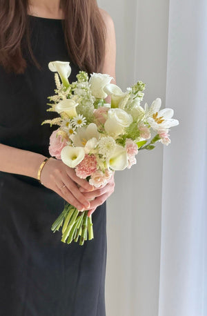 Premium hand-tied bridal bouquet with elegant white calla lilies, tulips, white roses, pink roses and astilbe, ideal for wedding photography and same day flower delivery KL.