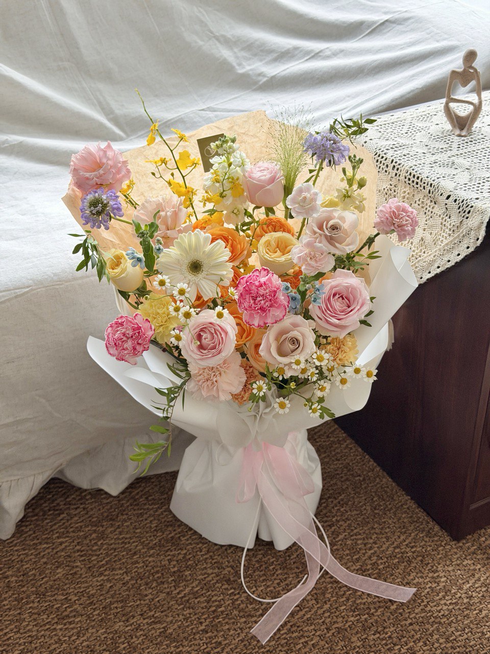 Elegant pastel bouquet with mixed flowers including roses and gerbera, perfect for gift delivery.