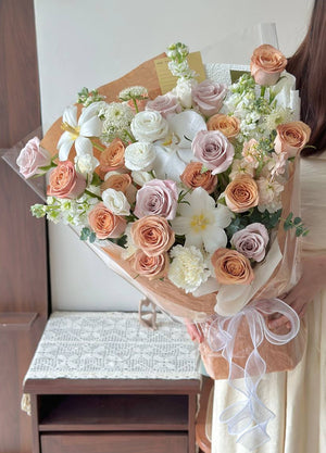 Elegant 45 stems rose bouquet with cappuccino roses and menta roses wrapped in premium brown paper.