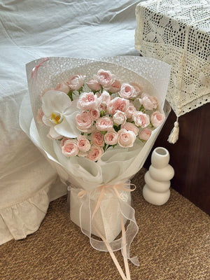 A kiss of fairy rose spray bouquet is the perfect gift for birthday or anniversary gift.