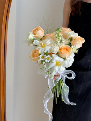 Soft champagne rose wedding bouquet with white florals and delicate greenery, ideal for ROM ceremony in KL and Selangor.