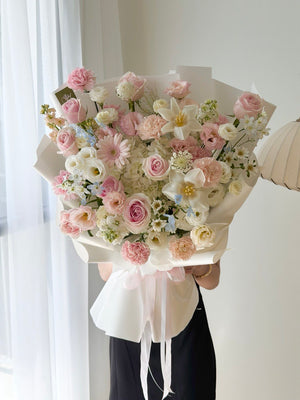Handcrafted birthday and anniversary bouquet with white hydrangea, roses and fresh blooms | Same Day Delivery Kuala Lumpur.