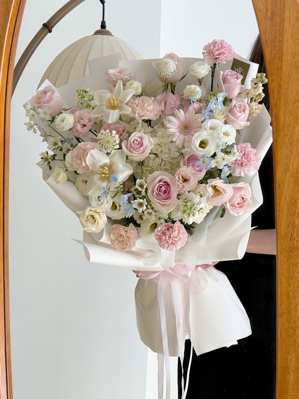 Elegant anniversary flower bouquet featuring one white hydrangea, premium pink roses and fresh seasonal flowers.