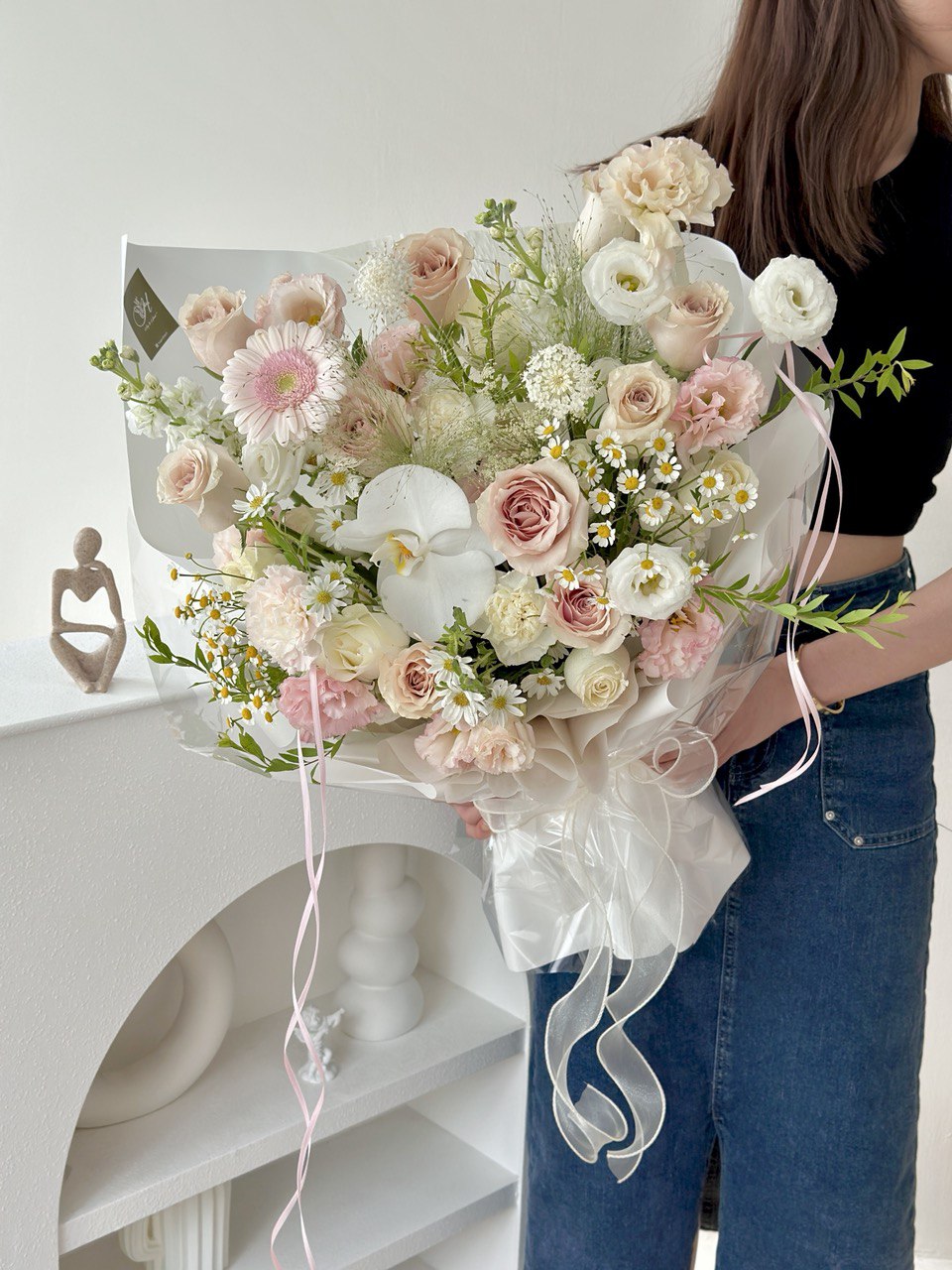 Fresh Quicksand roses with daisy, chamomile flowers and pastel blooms in Malaysia.