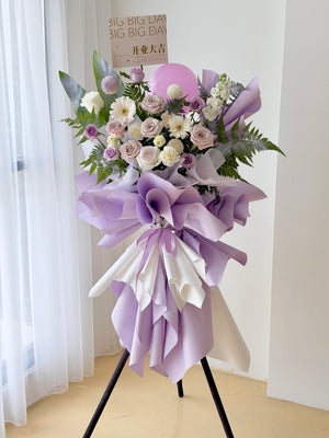 Luxury purple and white congratulatory flower stand for grand opening, fresh roses and greenery, same day delivery in KL and Selangor.